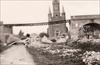 Opgeblazen brug aan de kerk te Nerem